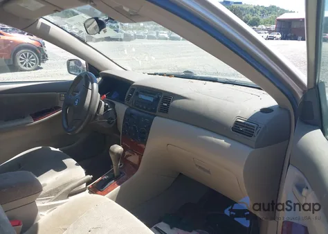 2005 Toyota Corolla Le z USA, uszkodzony, nr VIN 2T1BR32E35C465443